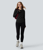Top de sport col rond ourlet arrondi manches longues avec trous pouces et poche