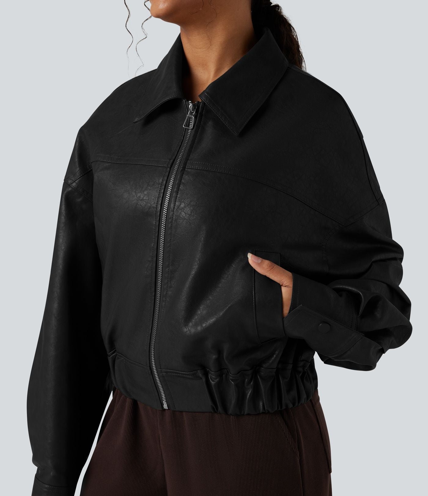 Veste décontractée en tissu enduit à fermeture éclair et manches longues avec poches