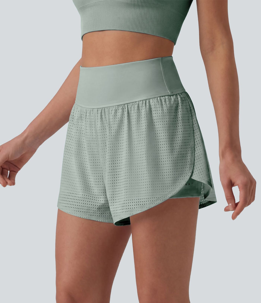 Short yoga 2-en-1 gainant taille haute à pois réfléchissants, ourlet arrondi croisé et œillets avec poches