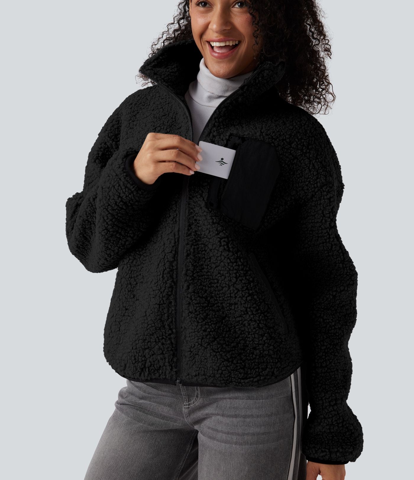 Veste sherpa col roulé manches longues avec poches
