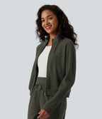 Veste casual côtelée à col montant, manches longues et fermeture zippée avec poches