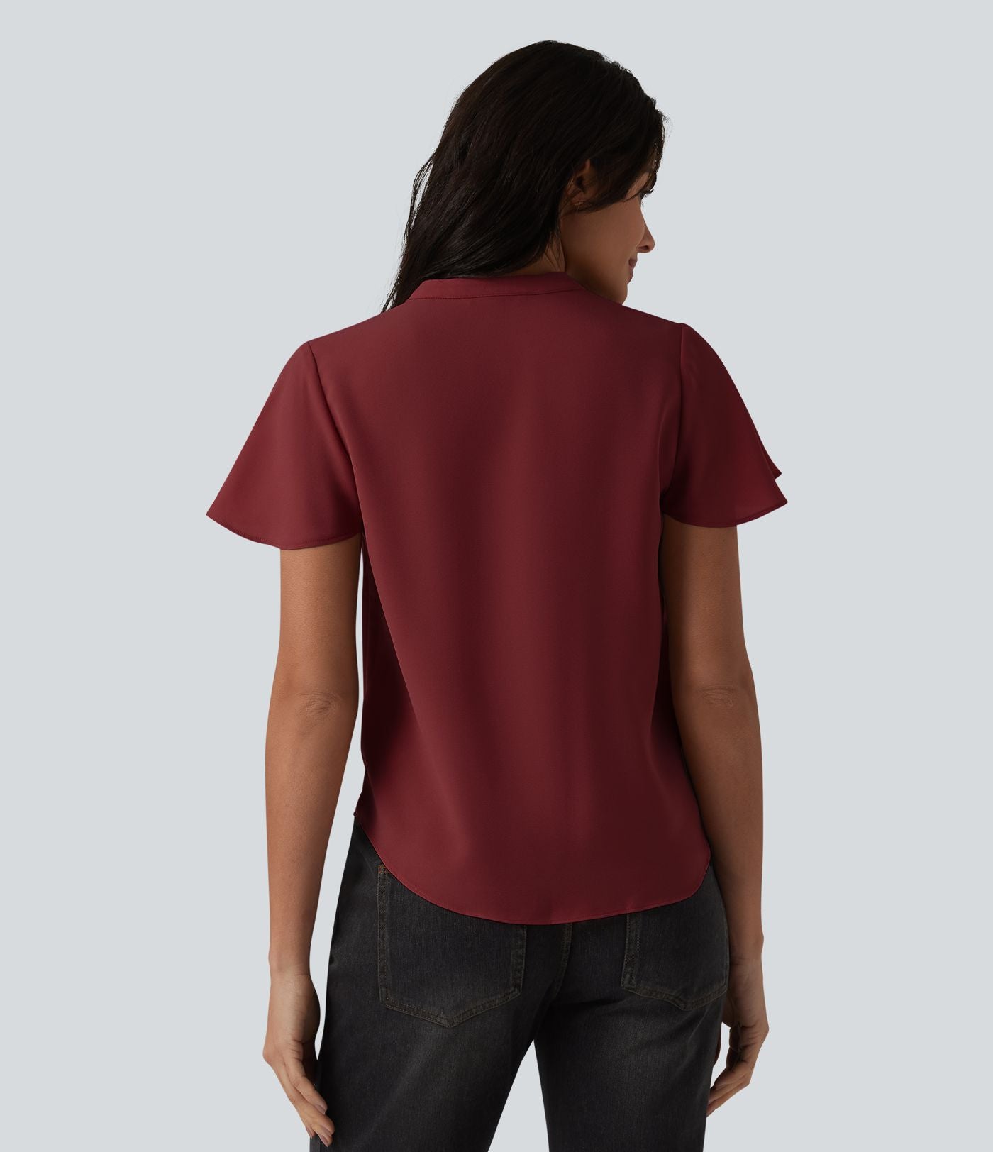 Blouse casual col V à manches volantées et ourlet arrondi