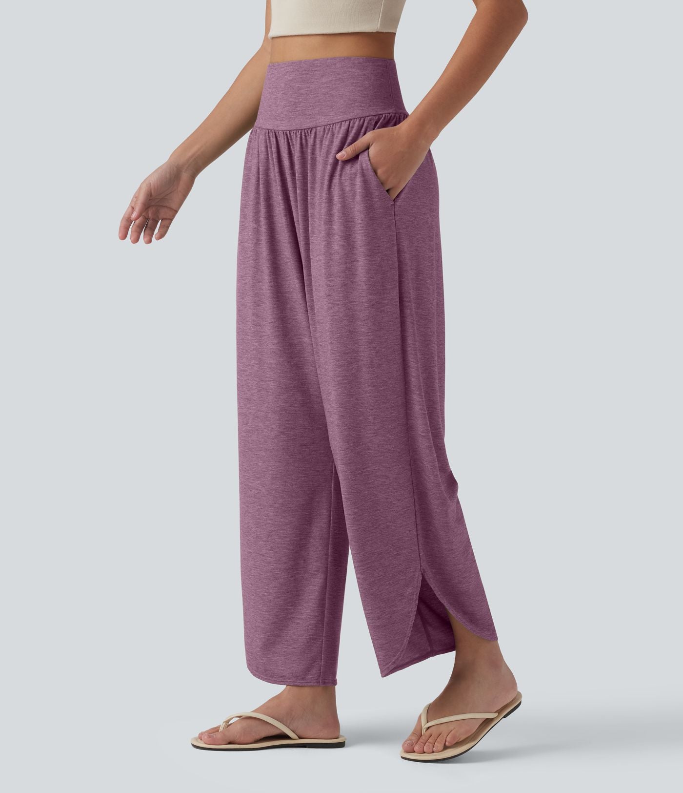 Pantalon décontracté taille haute gainant avec ourlet arrondi et poches