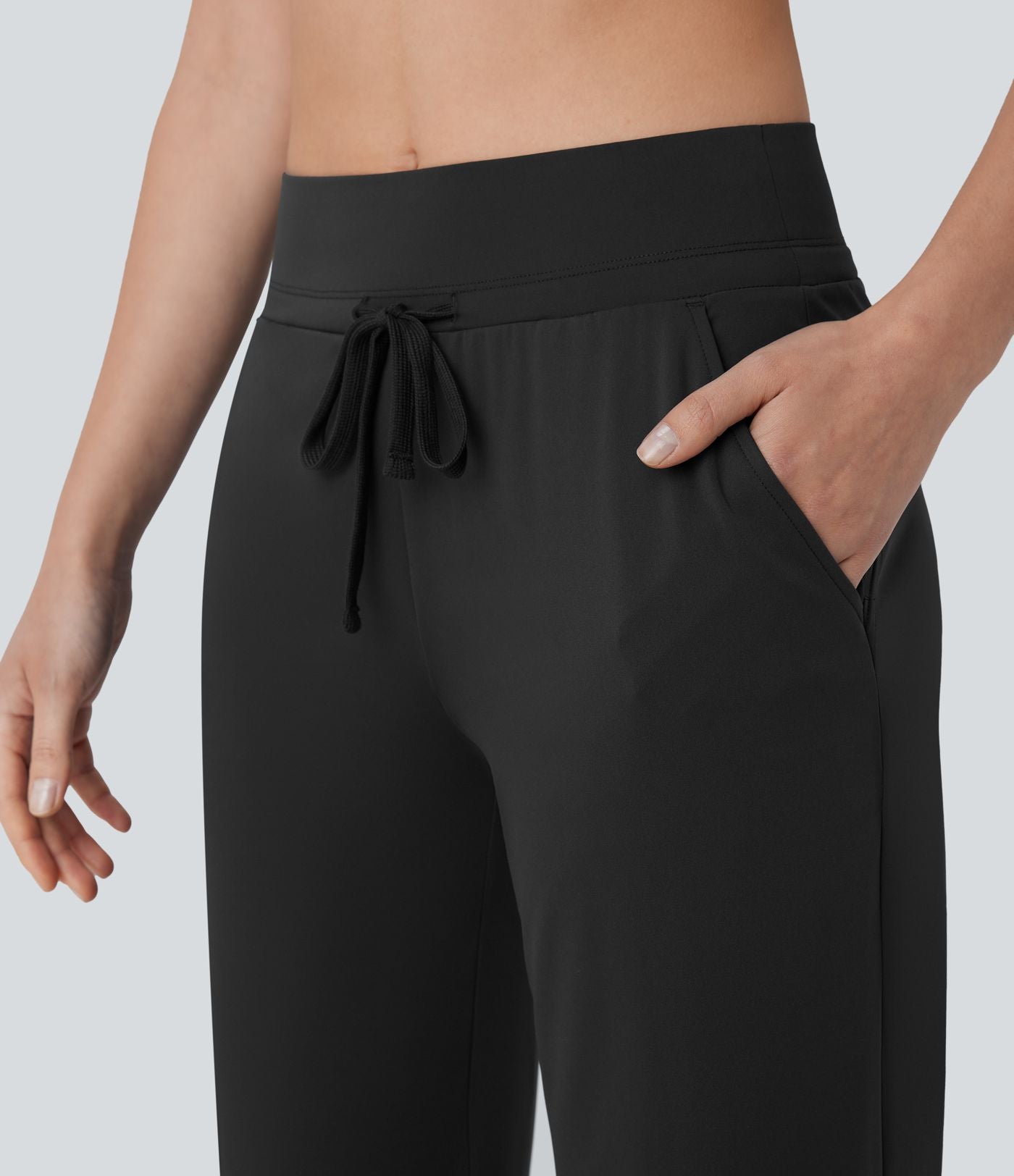Pantalon de yoga aéré à taille moyenne avec cordon de serrage, poches latérales, jambe droite et effet rafraîchissant Softlyzero™