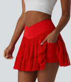 Jupe-short de tennis mini taille haute croisée fluide avec poches