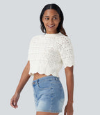 Pull décontracté en maille ajourée à col rond, manches courtes et bordure festonnée