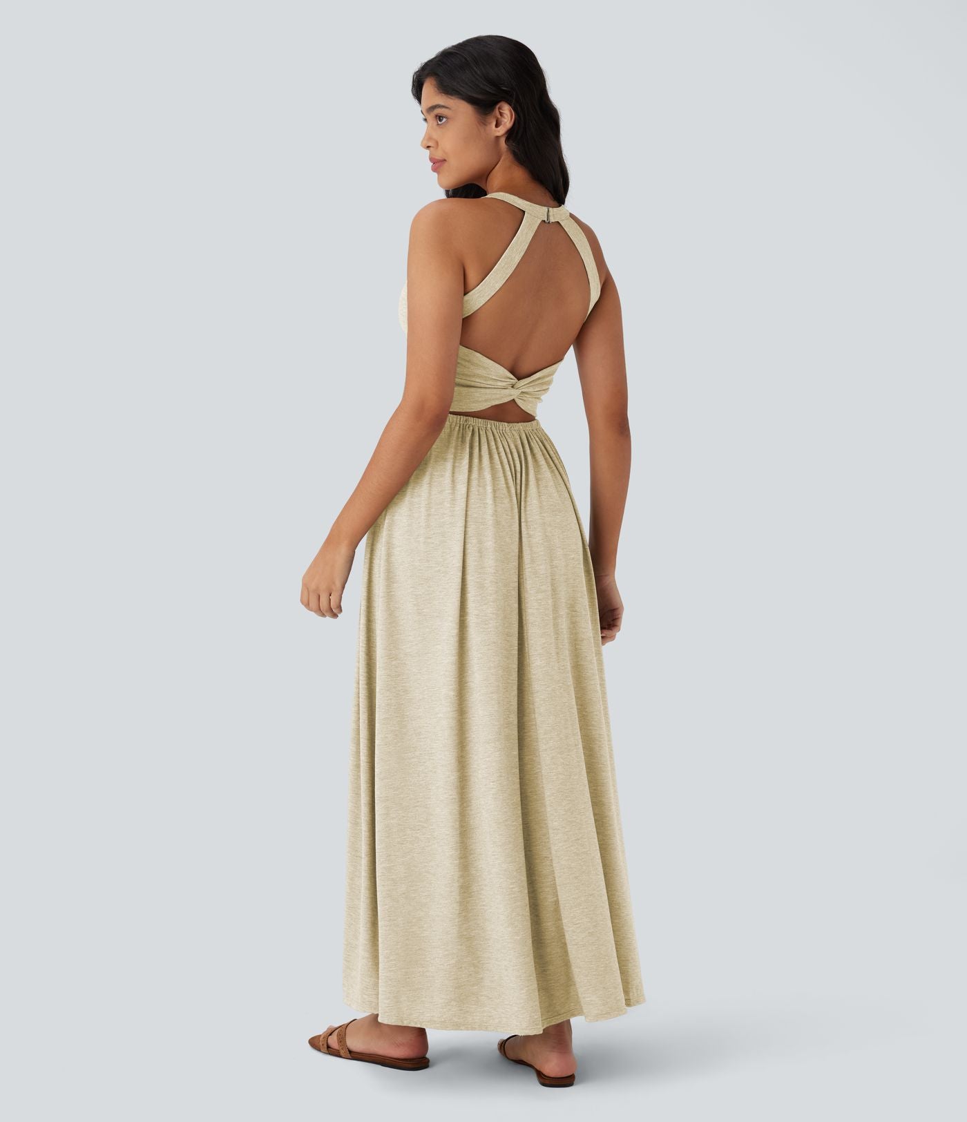 Robe longue fluide fendue avec poches latérales, dos nu et effet torsadé