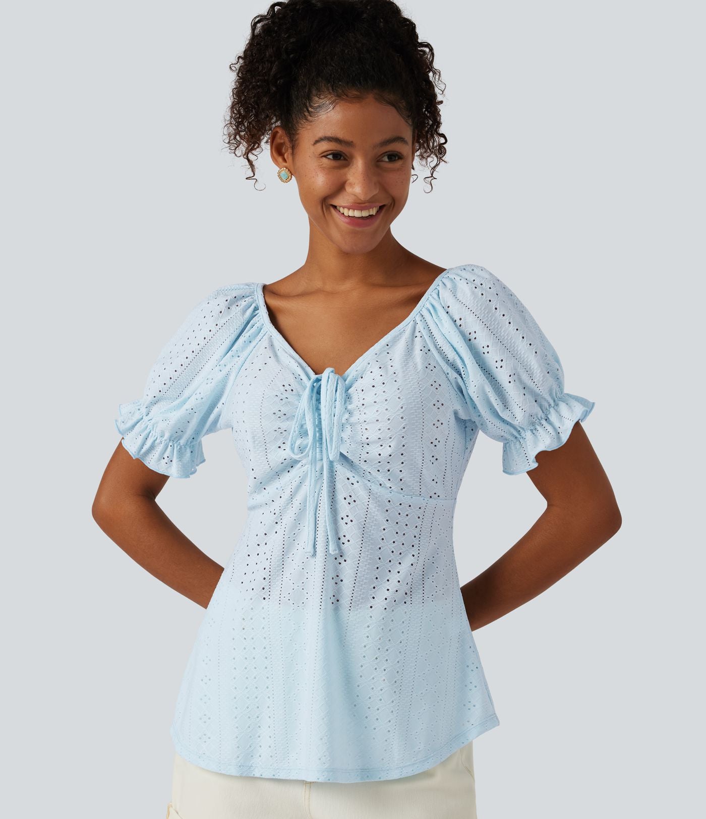 Blouse décontractée col V manches courtes bouffantes lacée ajourée