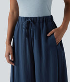 Pantalon décontracté effet lin jambes ballon taille haute avec cordon de serrage et poches