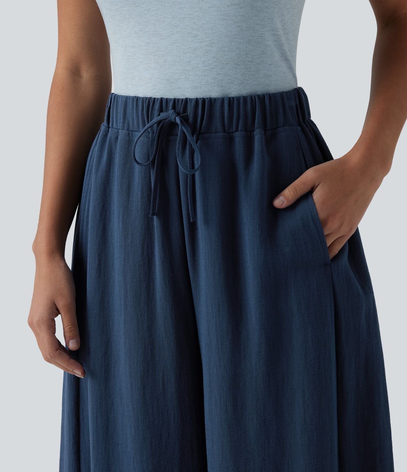 Pantalon décontracté effet lin jambes ballon taille haute avec cordon de serrage et poches