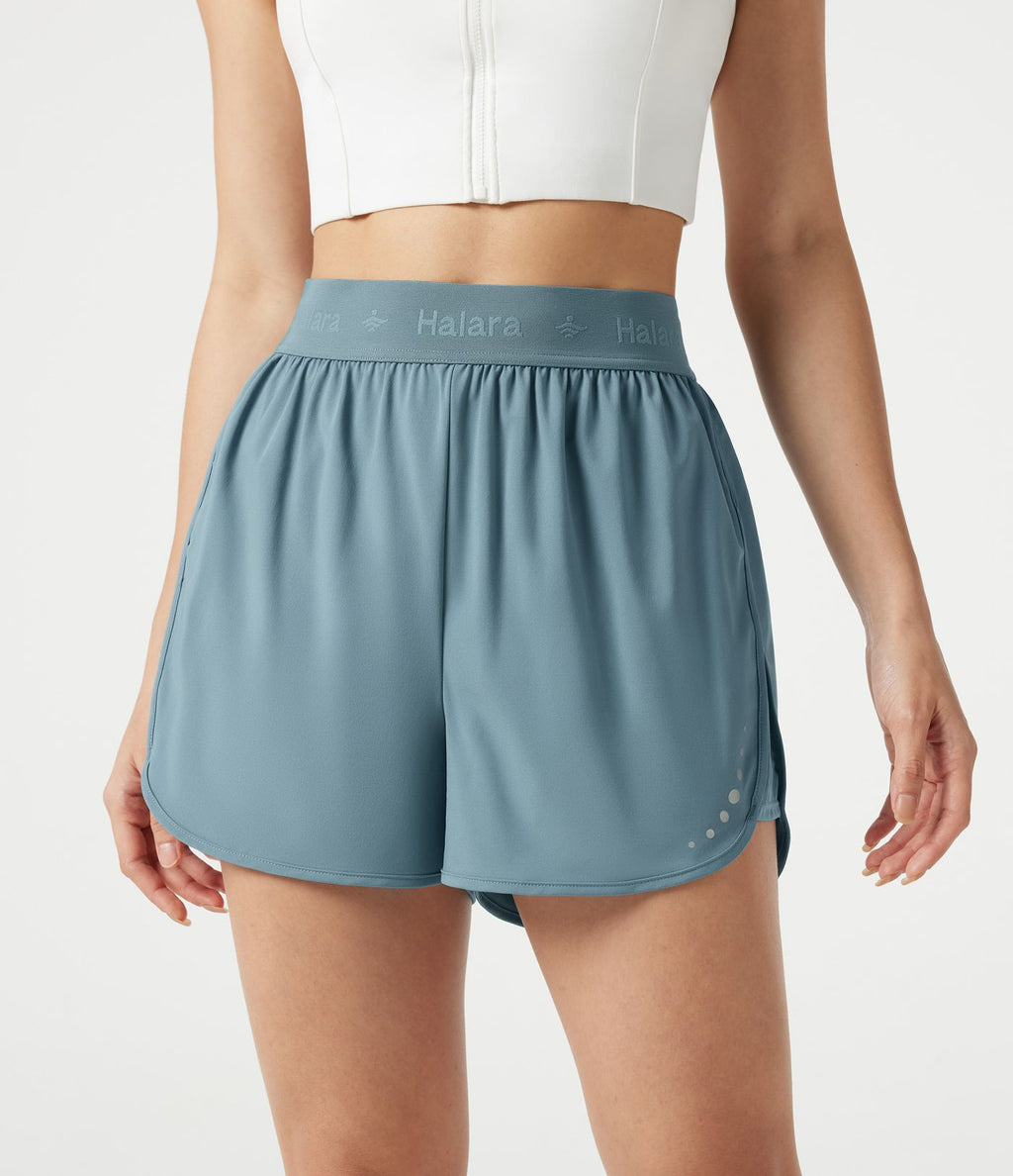 Short de sport 7,5 cm Breezeful™ 2-en-1 séchage rapide taille haute en mesh contrastant à poches
