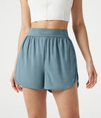 Short de sport 7,5 cm Breezeful™ 2-en-1 séchage rapide taille haute en mesh contrastant à poches