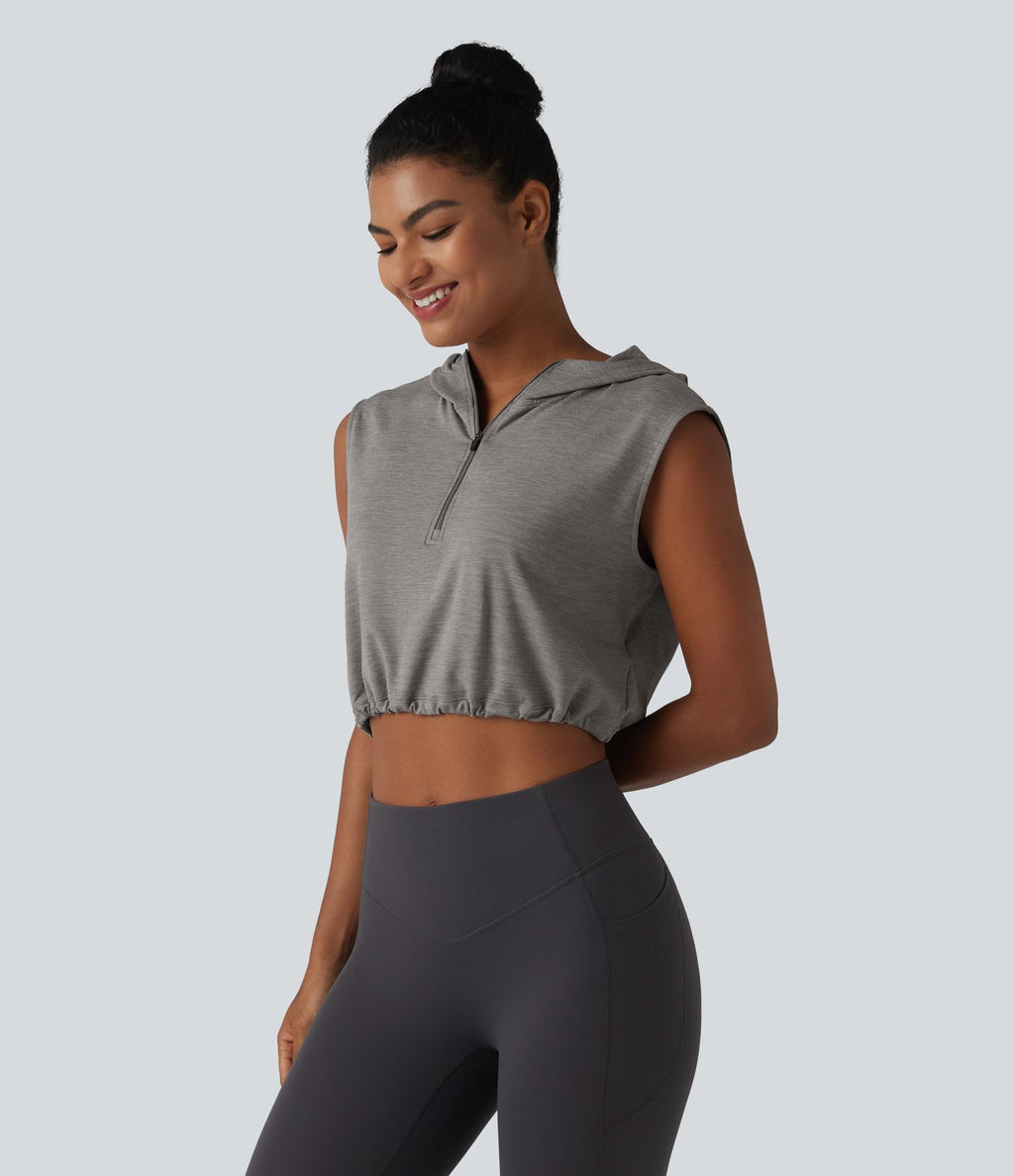 Débardeur de yoga court à capuche avec demi-zip