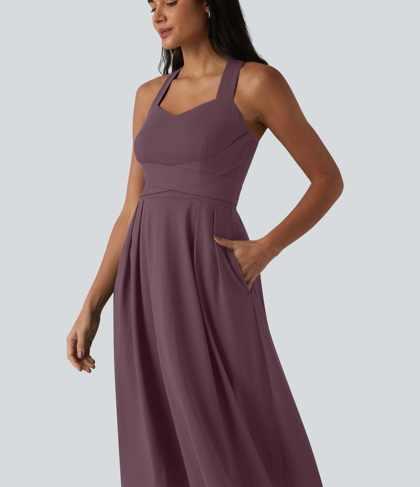 Robe midi fluide sans manches décolleté cœur avec bretelles croisées, nœud dans le dos et poches
