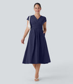 Robe midi Breezeful™ col V manches courtes à liens dans le dos séchage rapide avec poches latérales