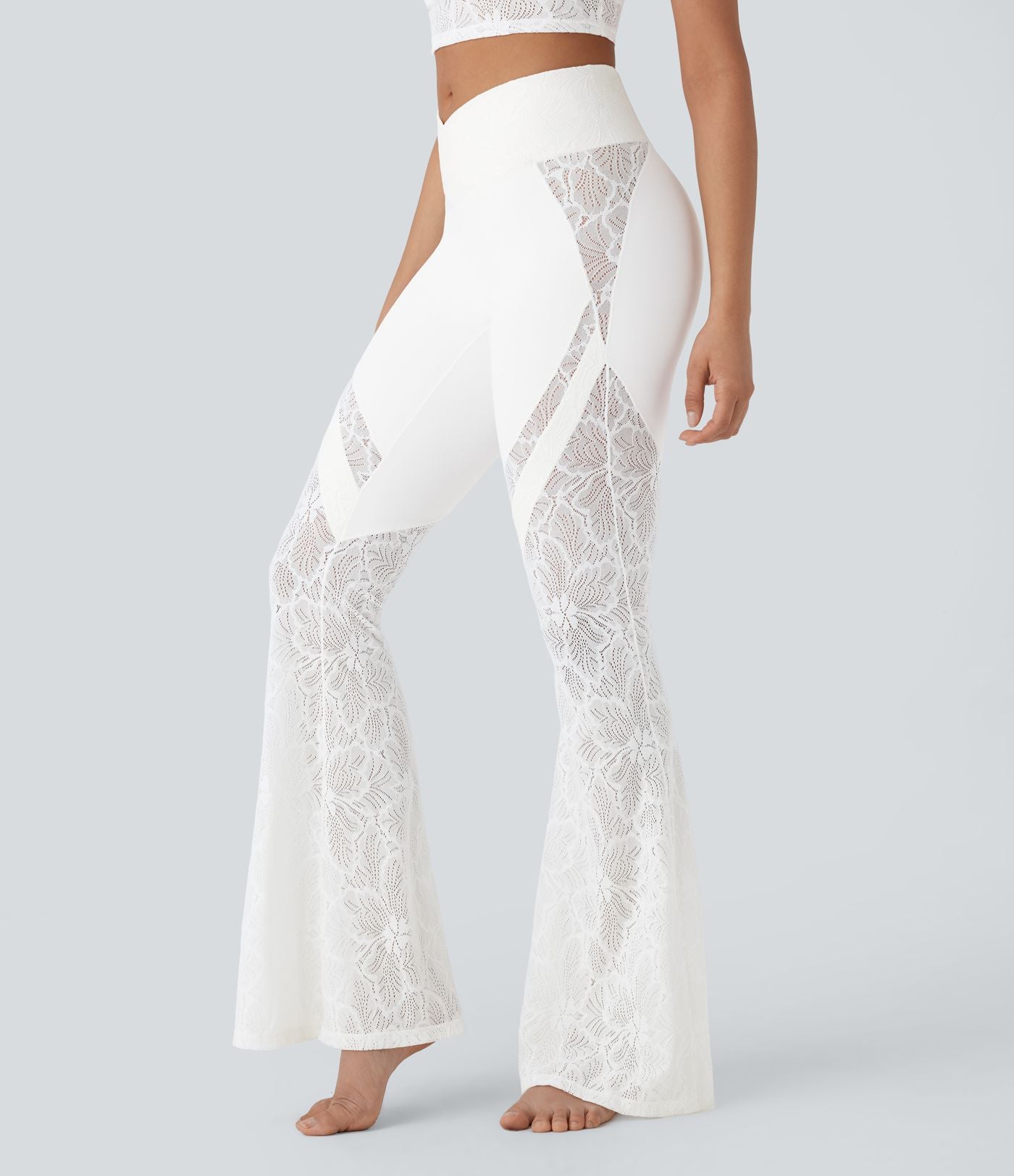 Pantalon de yoga évasé à taille haute croisée, poche arrière et dentelle