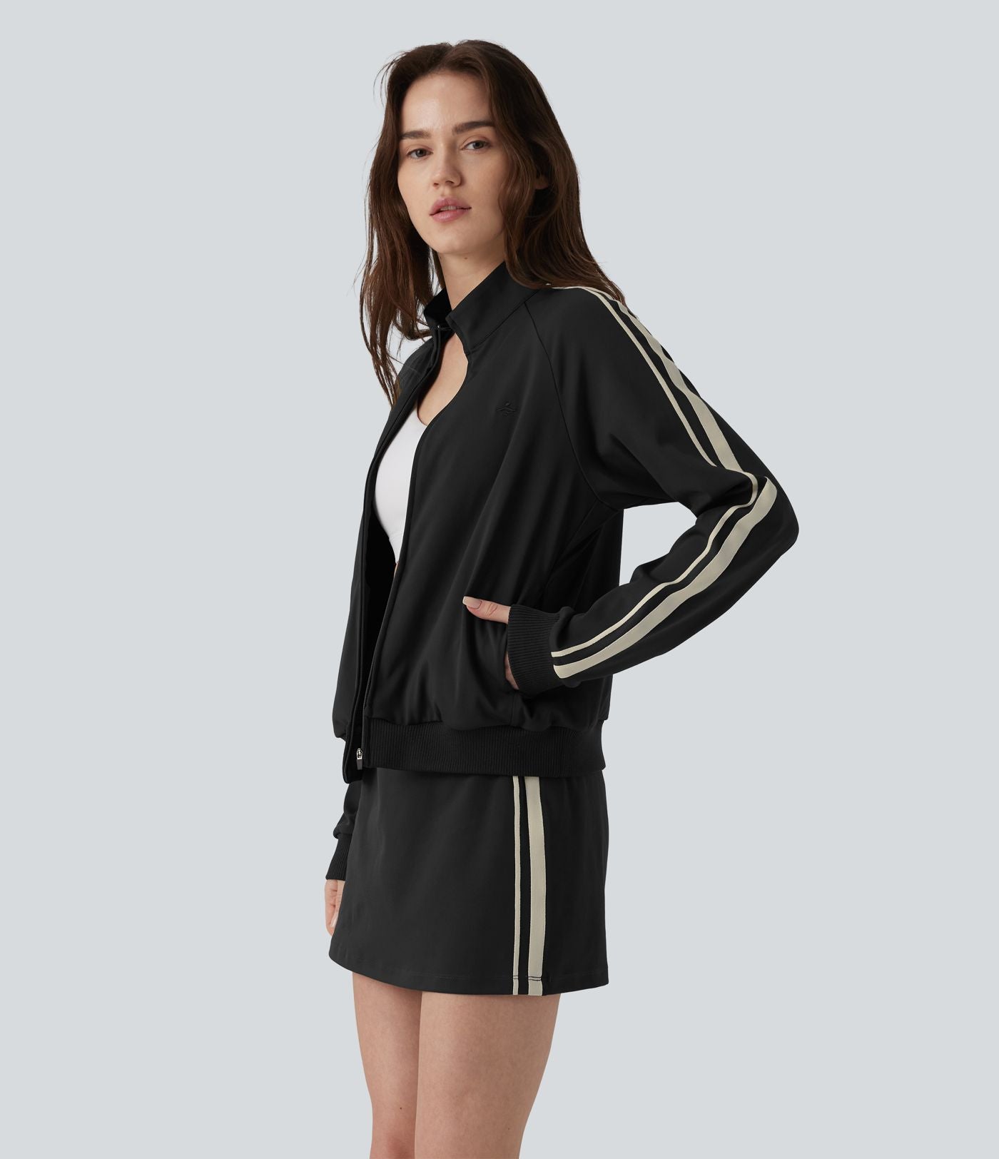 Veste de sport DayStretch col montant color block à rayures avec poches
