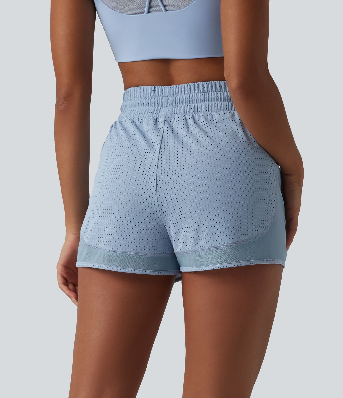Short de sport 2 en 1 taille haute, cordon de serrage et œillets, en maille respirante