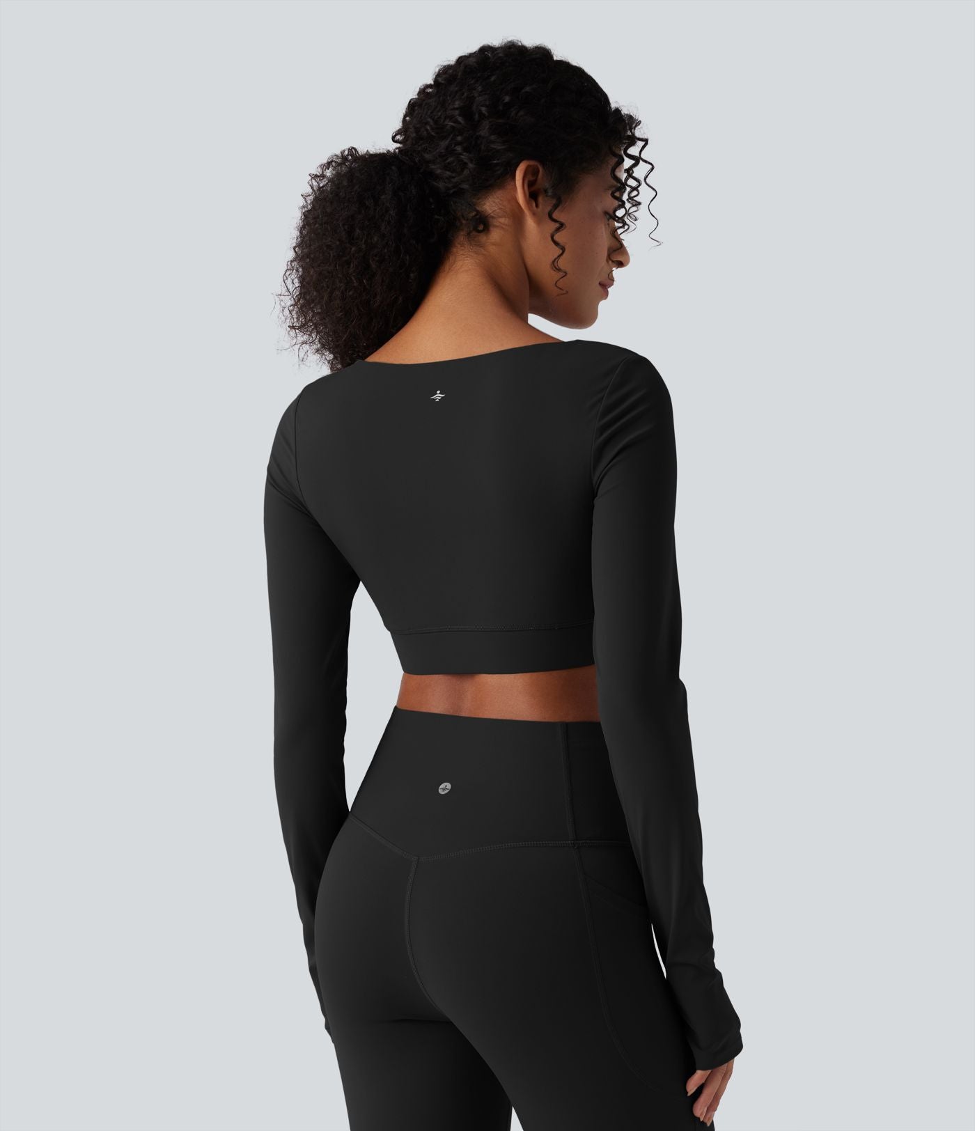 Halara UltraSculpt™ Top court de sport push-up à manches longues avec passants pouces et ourlet croisé