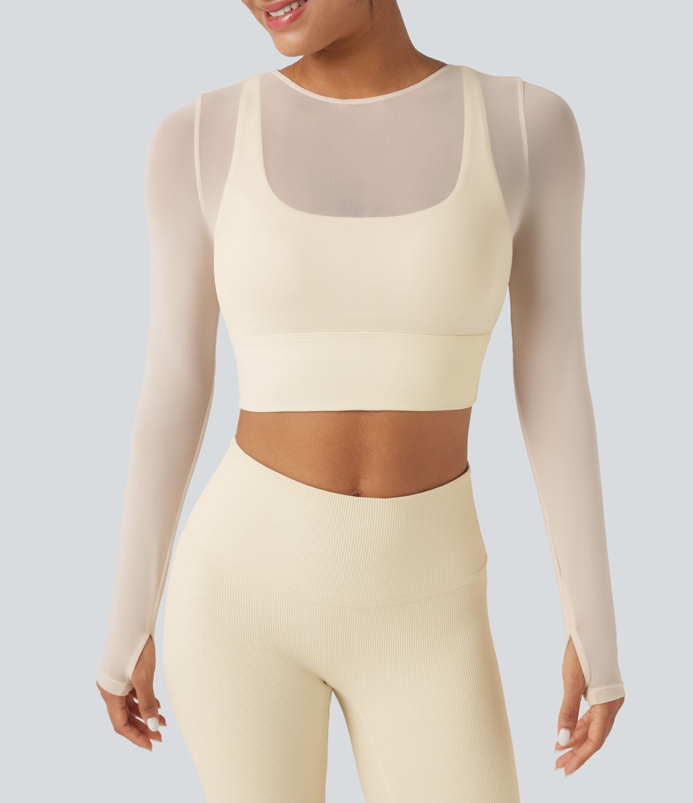 Haut de sport yoga cropped 2-en-1 manches longues mesh contrastant à trous pouces