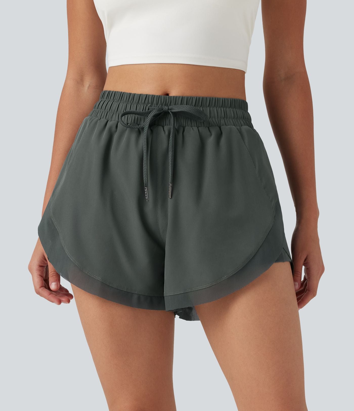 Short de running 2-en-1 taille mi-haute 7,5 cm avec cordon, ourlet incurvé, mesh contrasté et poches