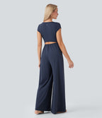 Combinaison de yoga Softlyzero™ Airy Cool Touch à col cranté, manches courtes, jambes larges et poches latérales - Édition Easy Peasy