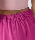 Pantalon tailleur ample, taille moyenne, coupe barrel, à poches