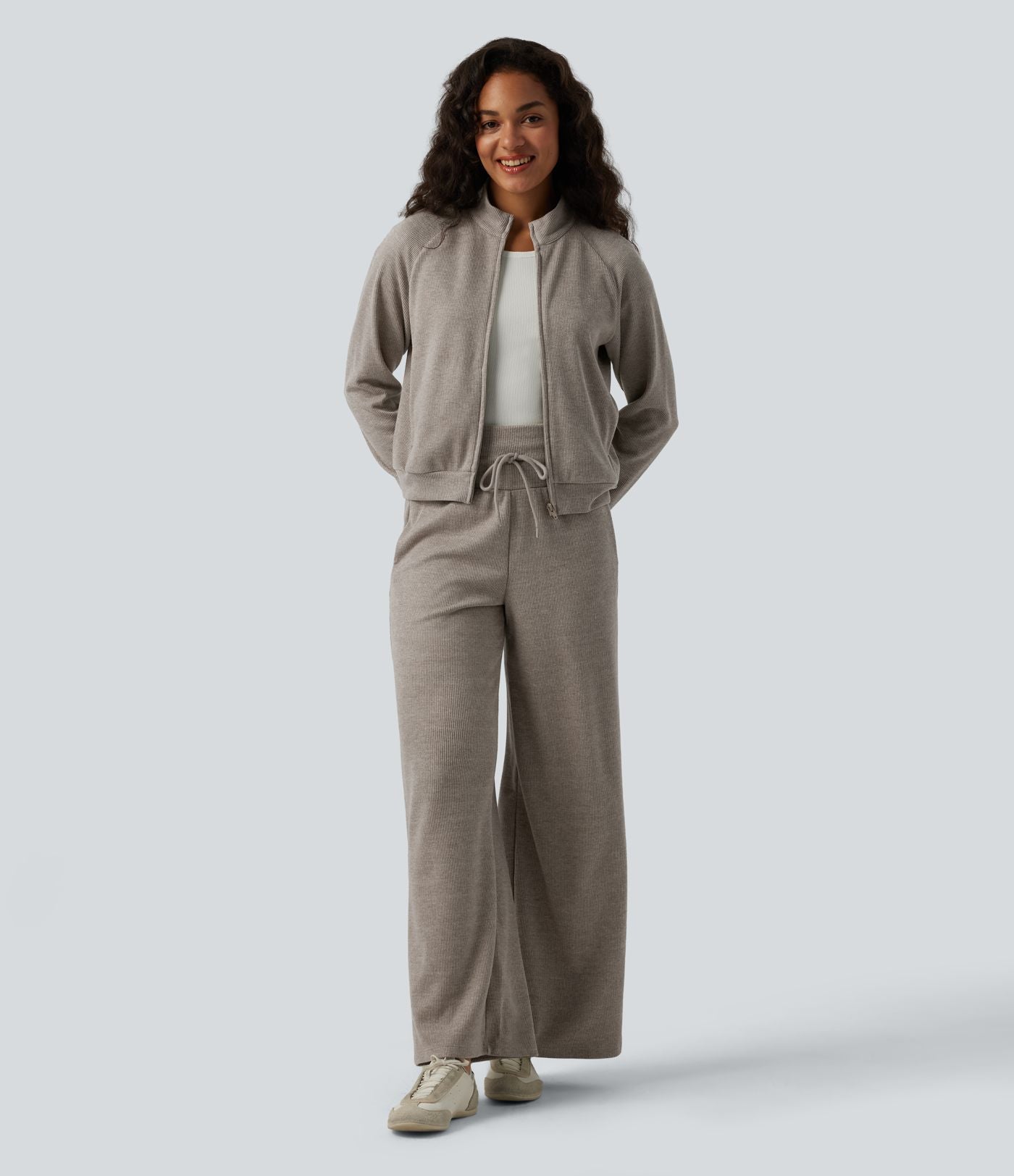 Veste casual côtelée à col montant, manches longues et fermeture zippée avec poches