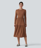 Robe tailleur mi-longue col rond manches longues ourlet à volants étagés