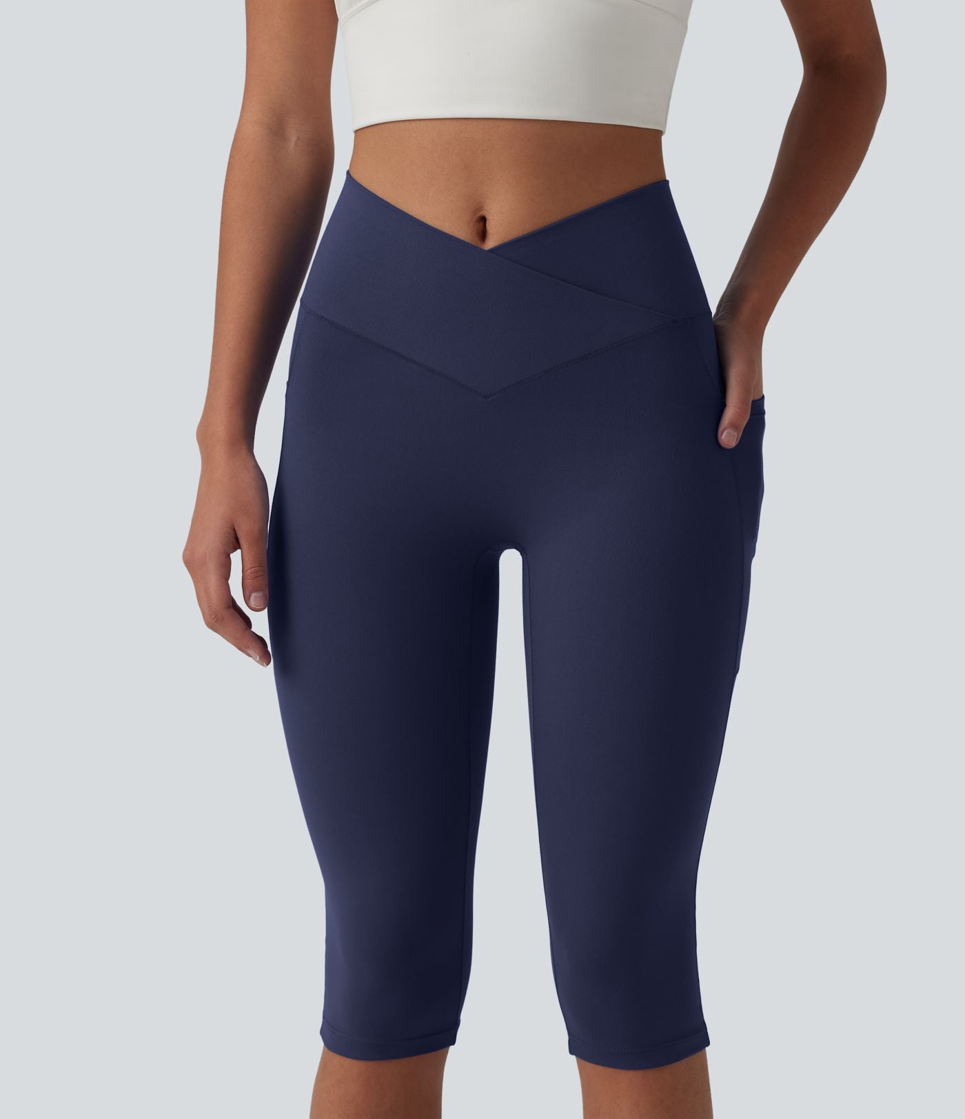 Legging de yoga corsaire SoftlyZero™ taille haute croisé avec poches - UPF50+