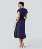 Robe midi Breezeful™ col V manches courtes à liens dans le dos séchage rapide avec poches latérales