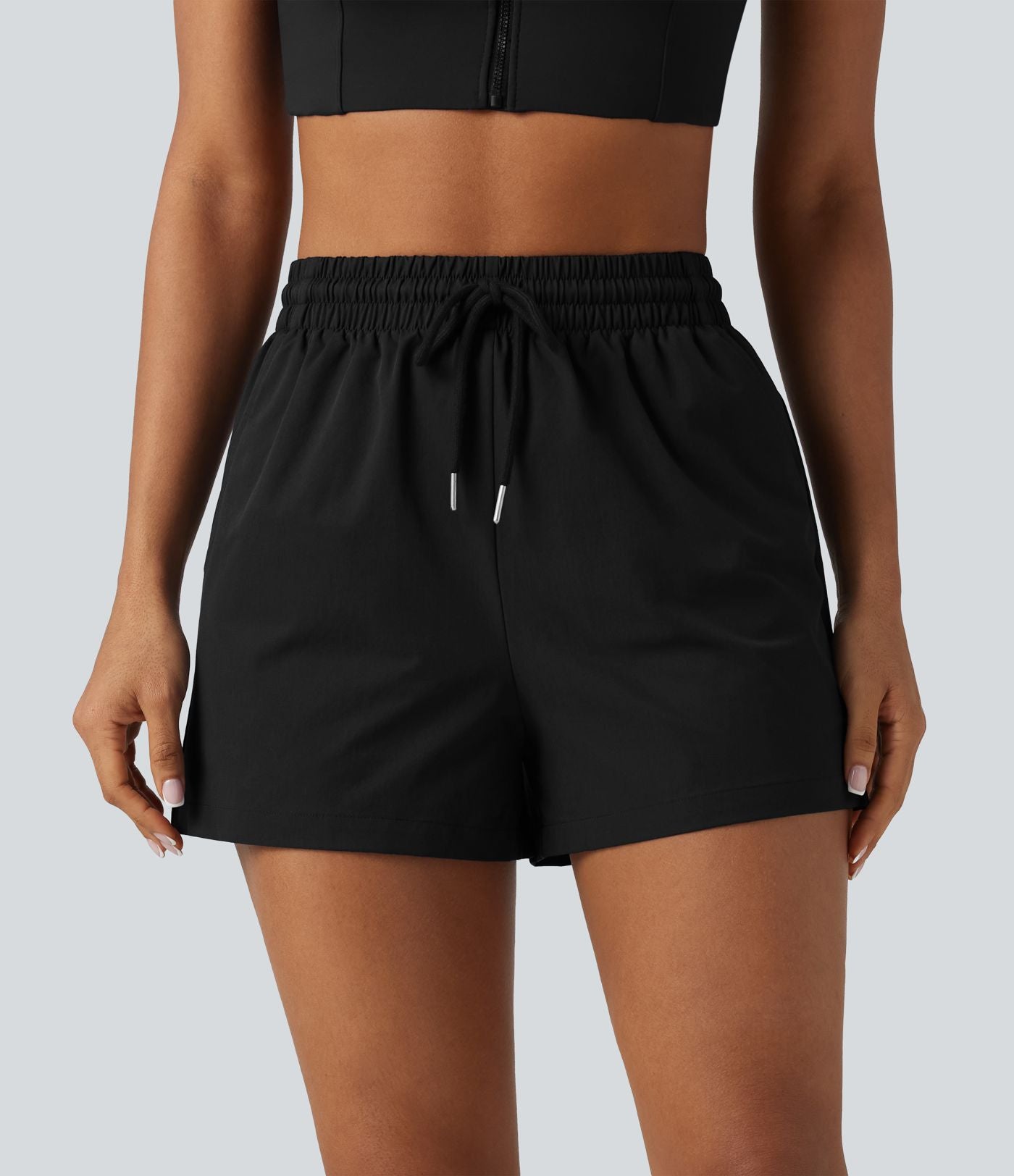 Short de sport baggy taille haute extensible en popeline avec cordon de serrage et poches