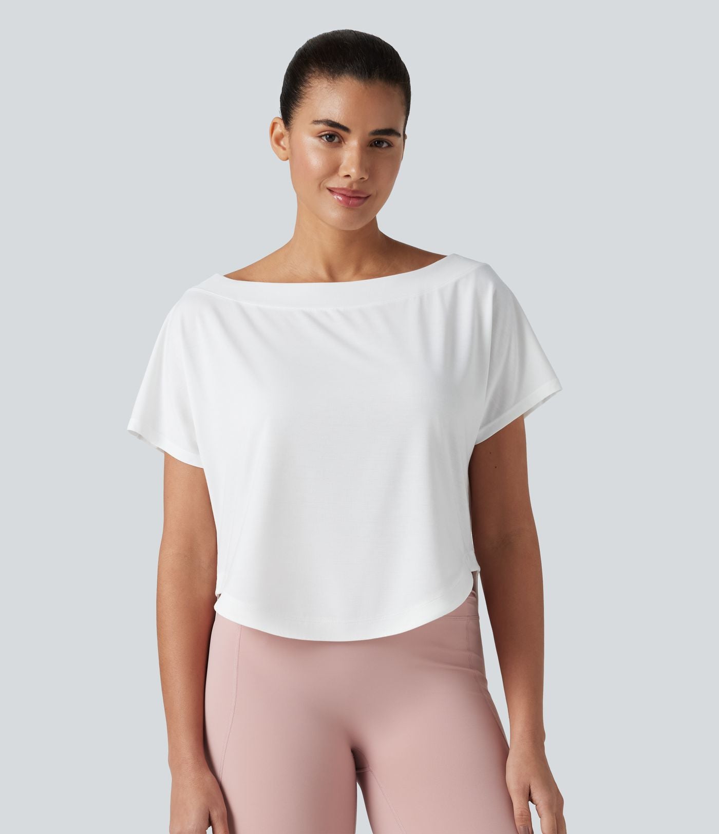 Haut de sport yoga asymétrique à une épaule manches courtes ourlet arrondi asymétrique séchage rapide