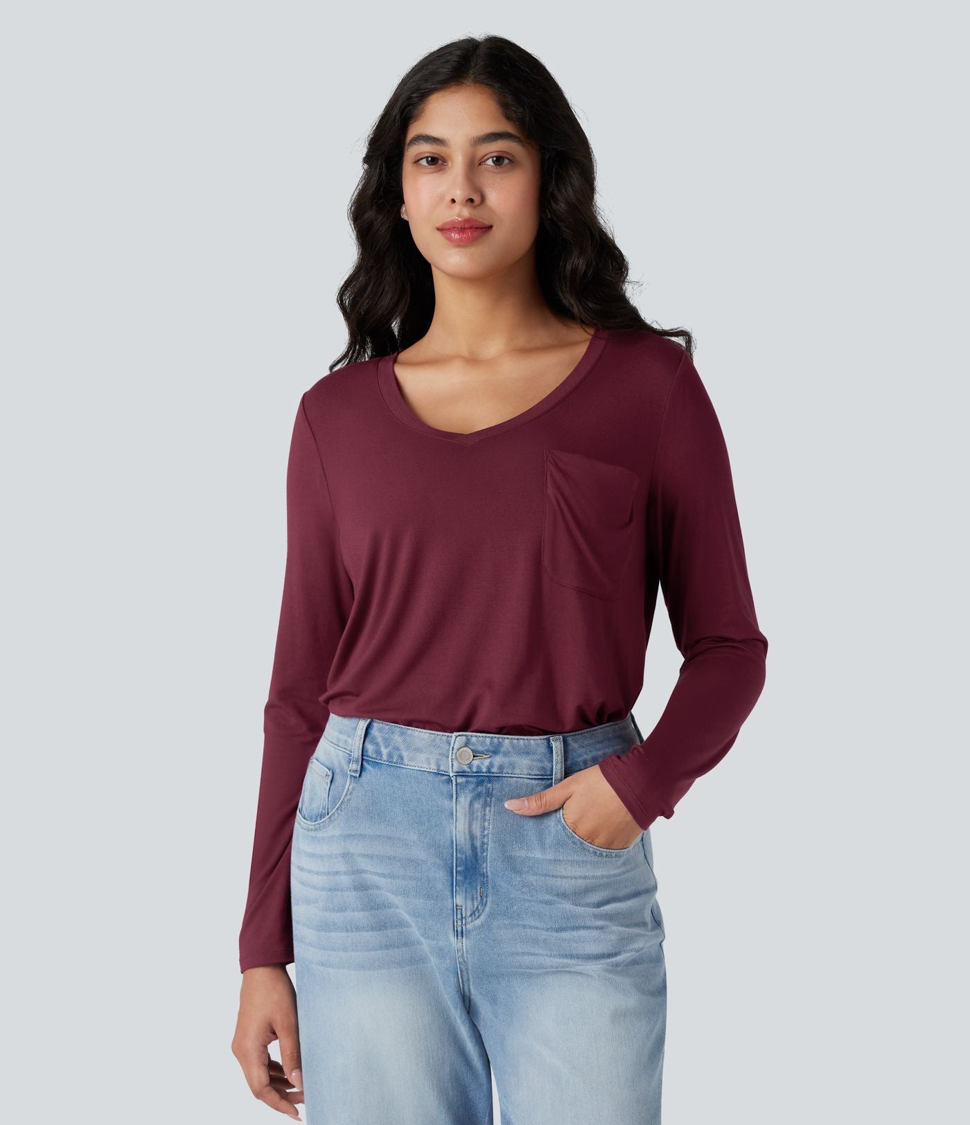 T-shirt col V manches longues ourlet arrondi coupe décontractée avec poche