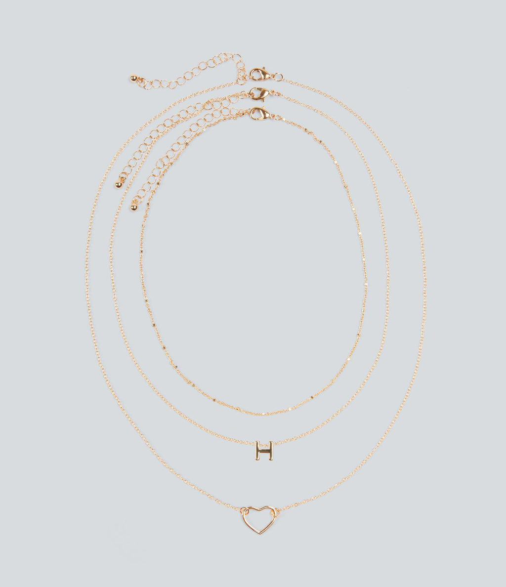 Ensemble de colliers pendentifs lettre + cœur