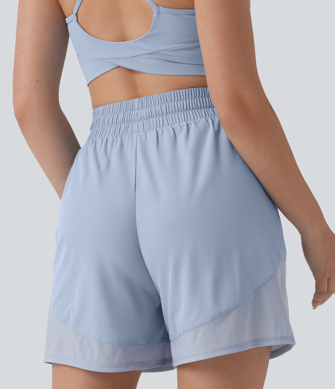 Short ample de yoga Breezeful™ 12,5 cm taille haute avec cordon de serrage, empiècements en mesh contrastant, séchage rapide et poches