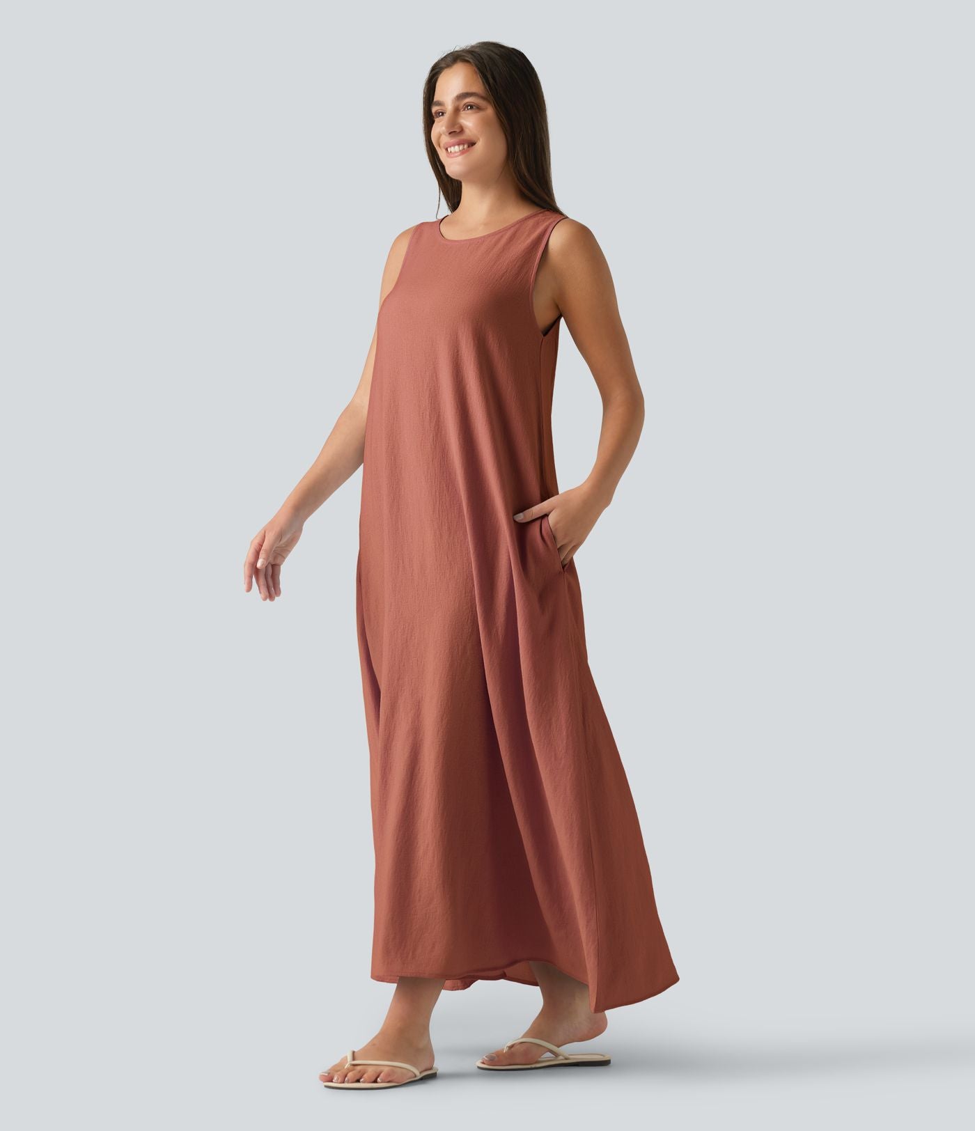 Robe débardeur midi unie sans manches à col rond et poches
