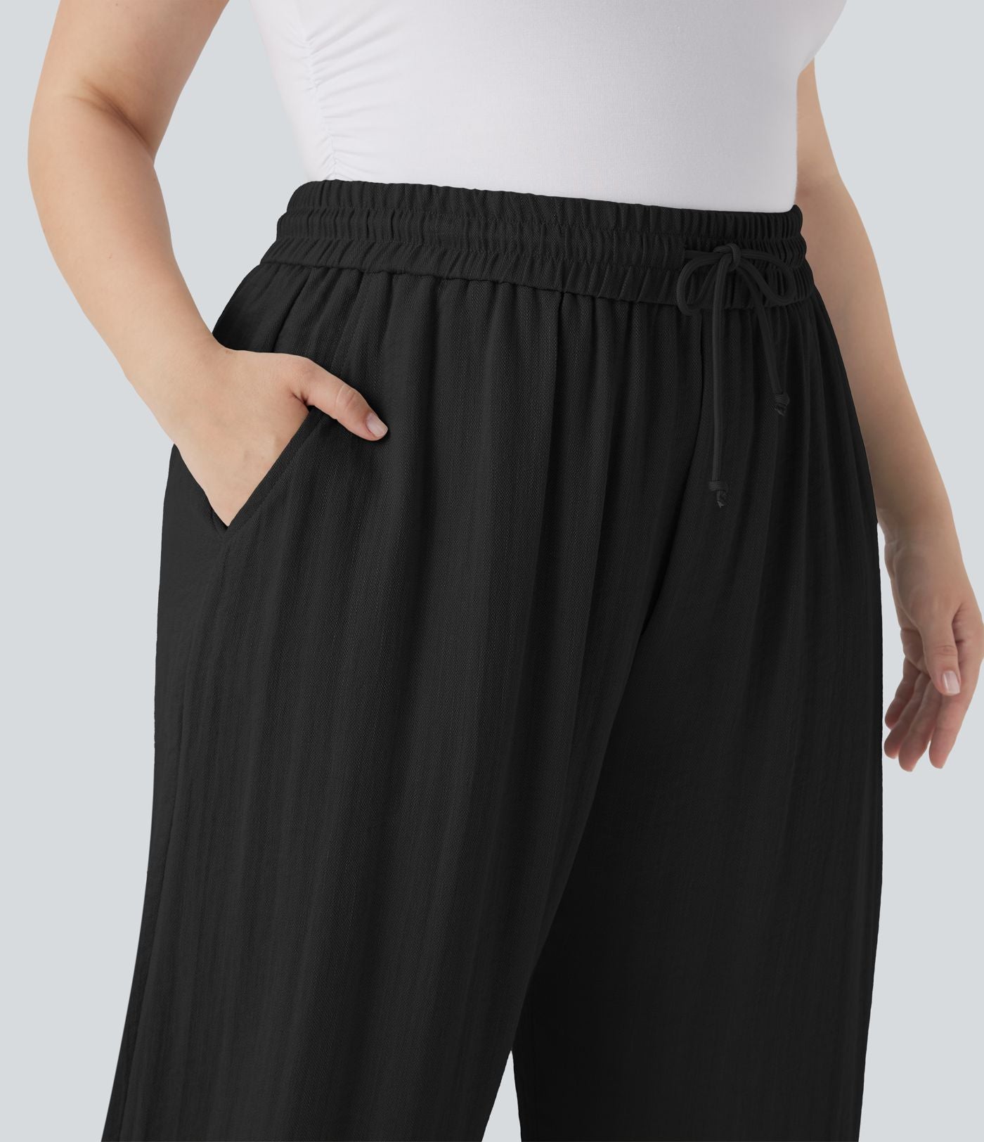 Pantalon décontracté grande taille large fluide taille haute effet lin avec cordon de serrage et poches