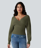 Pull col V manches chauve-souris longues à découpes