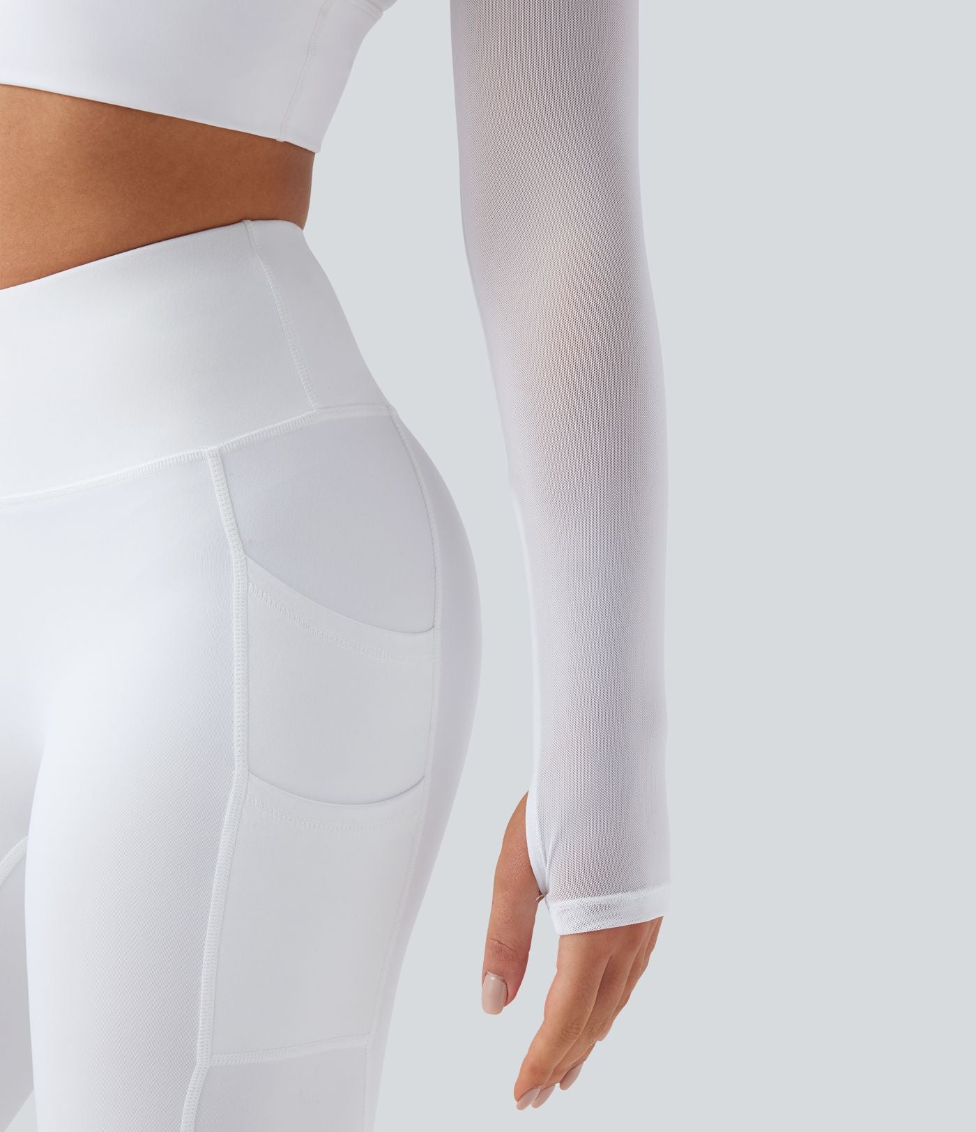 Haut de sport yoga cropped 2-en-1 manches longues mesh contrastant à trous pouces