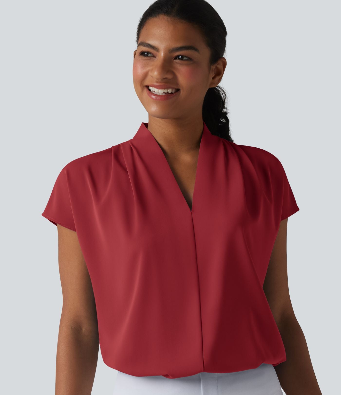 Blouse esprit bureau ample défroissage facile, col V et manches chauve-souris
