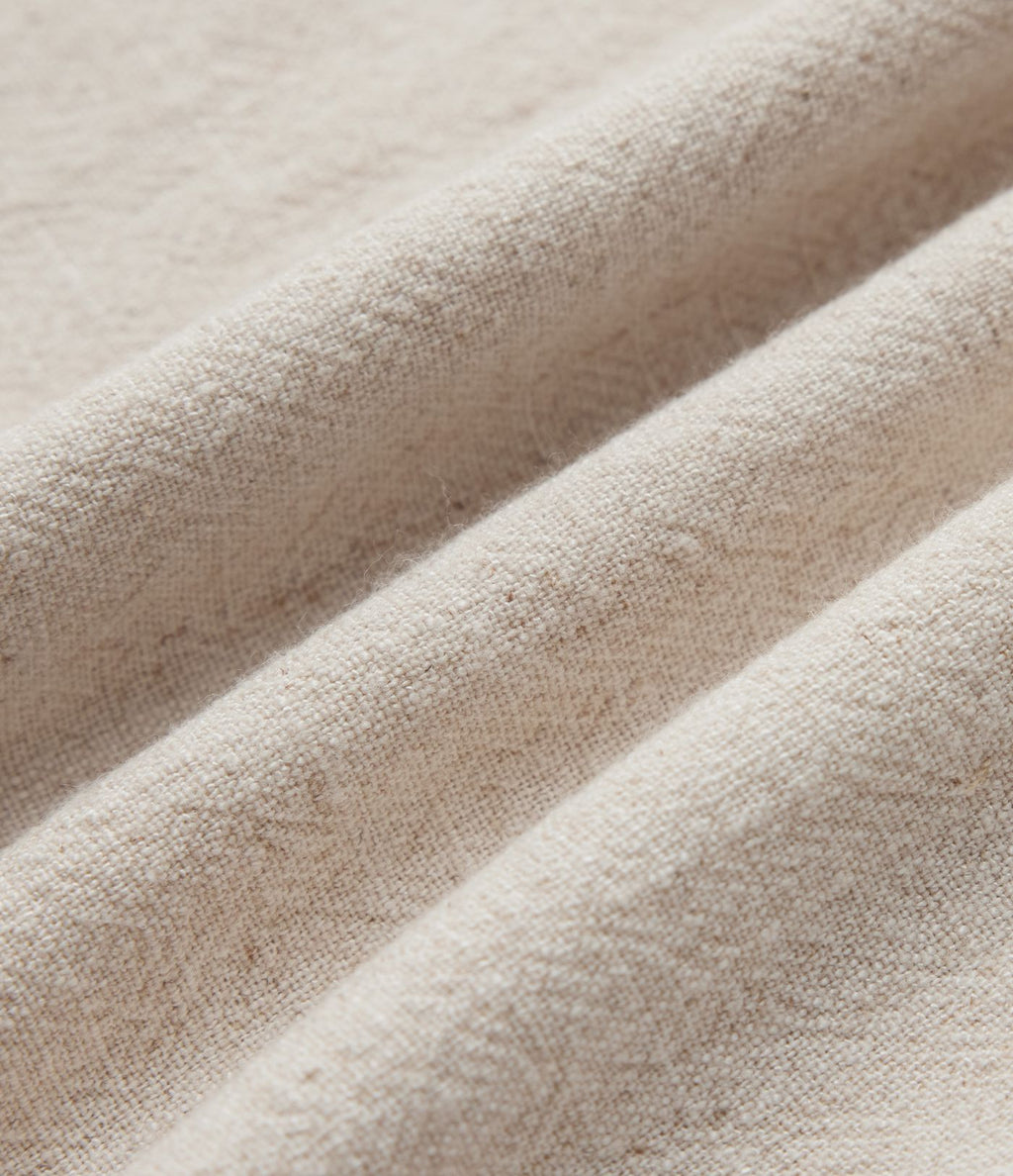 Chemisier tailleur en mélange de lin col V sans manches avec ourlet fendu