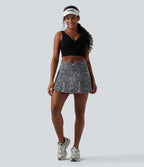 Jupe-short de tennis mini taille haute croisée imprimé léopard avec poches