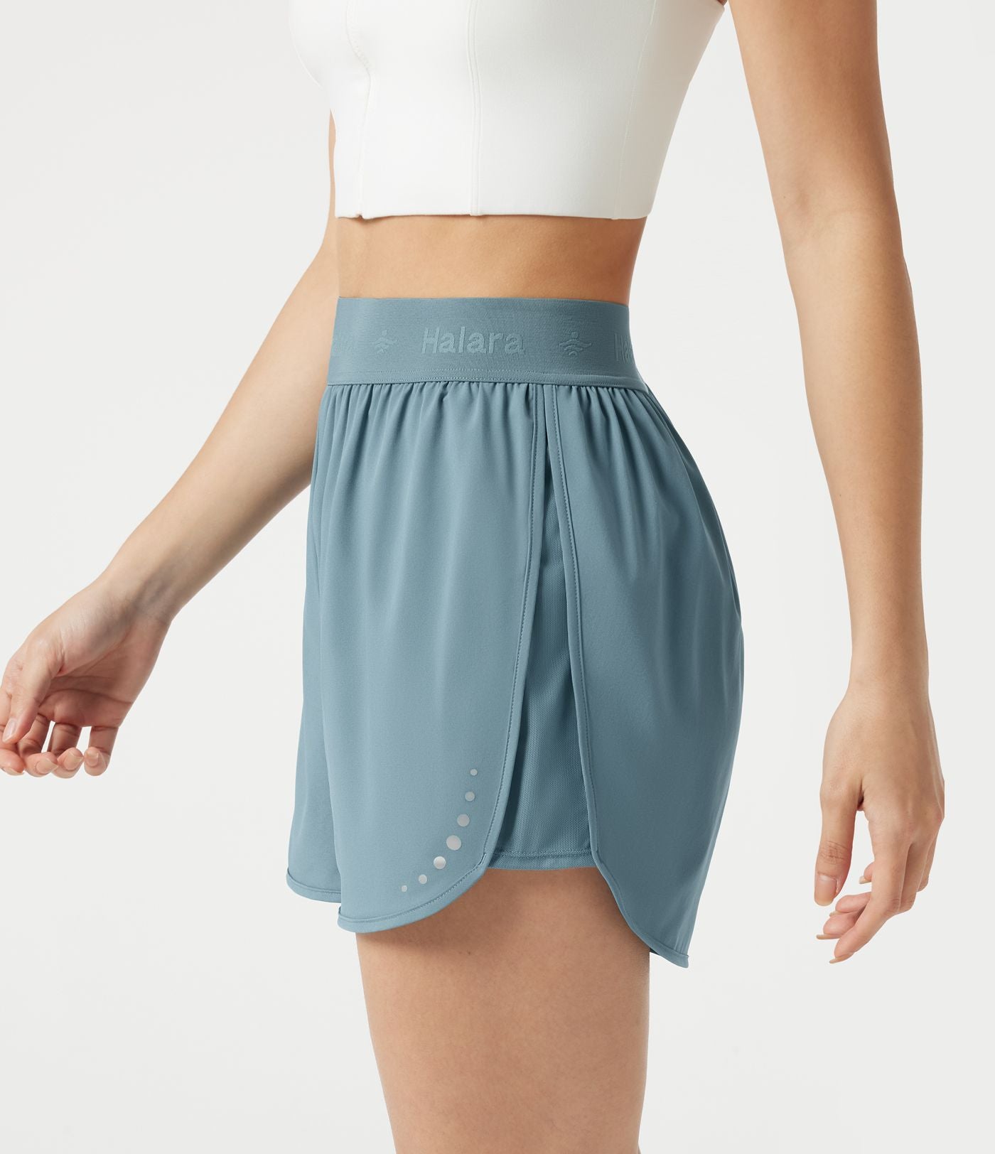 Short de sport 7,5 cm Breezeful™ 2-en-1 séchage rapide taille haute en mesh contrastant à poches
