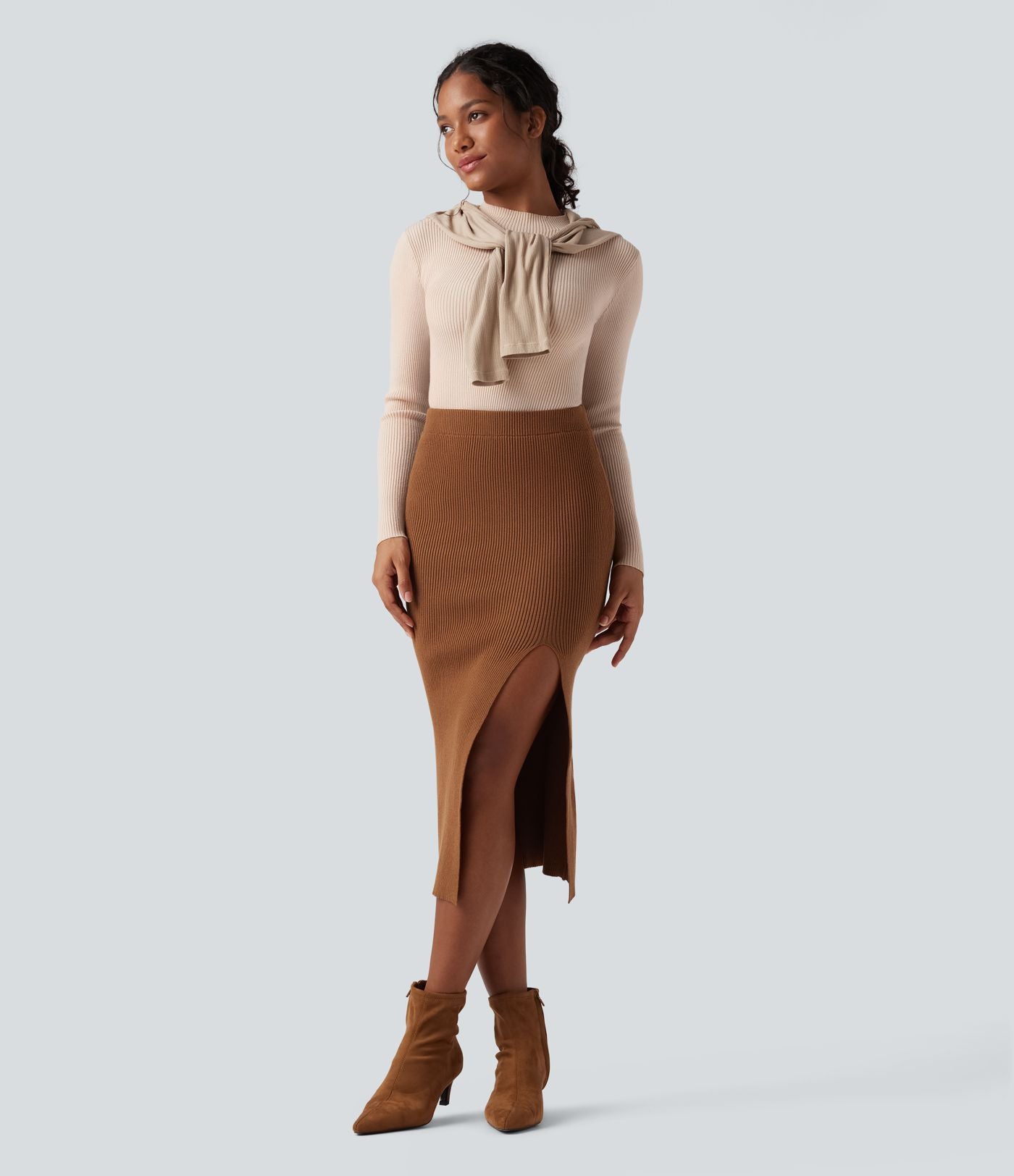 Jupe pull mi-longue moulante fendue taille haute