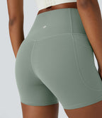 Short cycliste d'entraînement gainant taille haute UltraSculpt™ SoCinched à poches latérales 12,5 cm