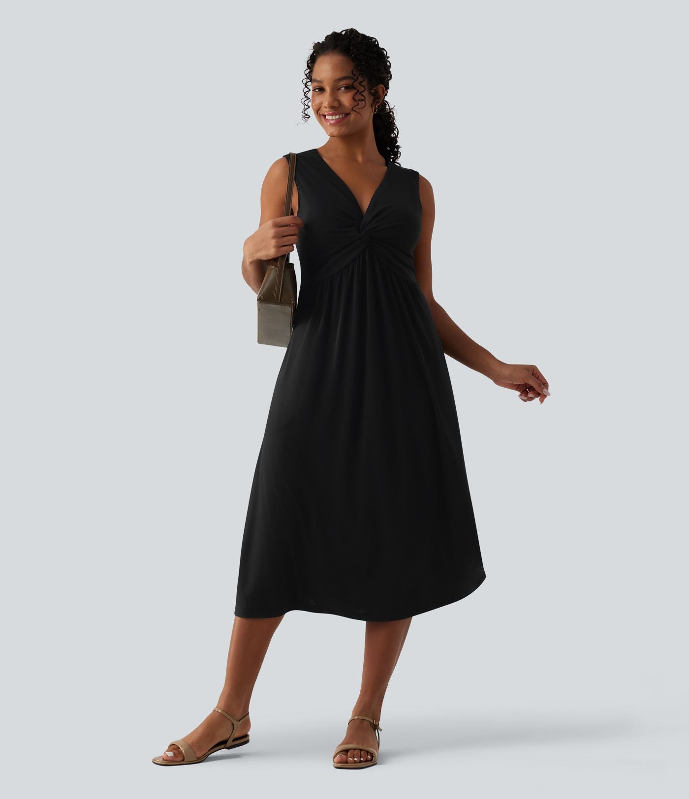 Robe midi évasée décontractée col V sans manches torsadée avec poches