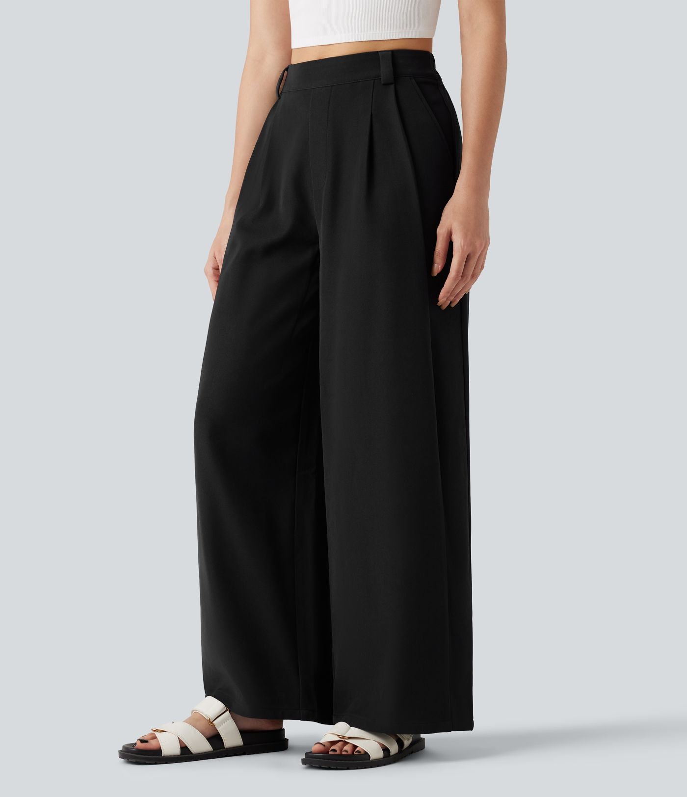 Pantalon tailleur large, taille moyenne, à poches