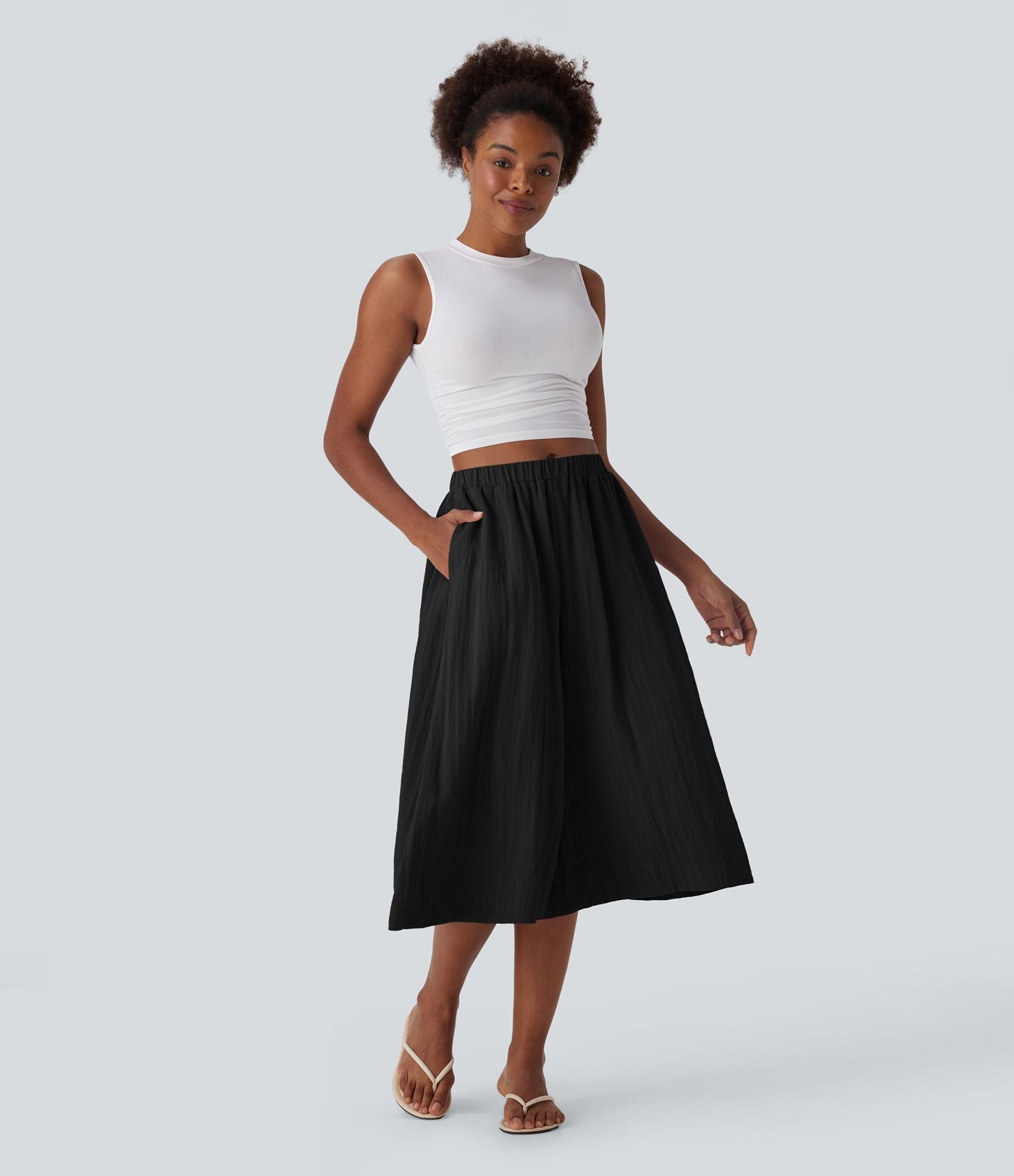Pantalon fluide large taille mi-haute effet lin avec poche