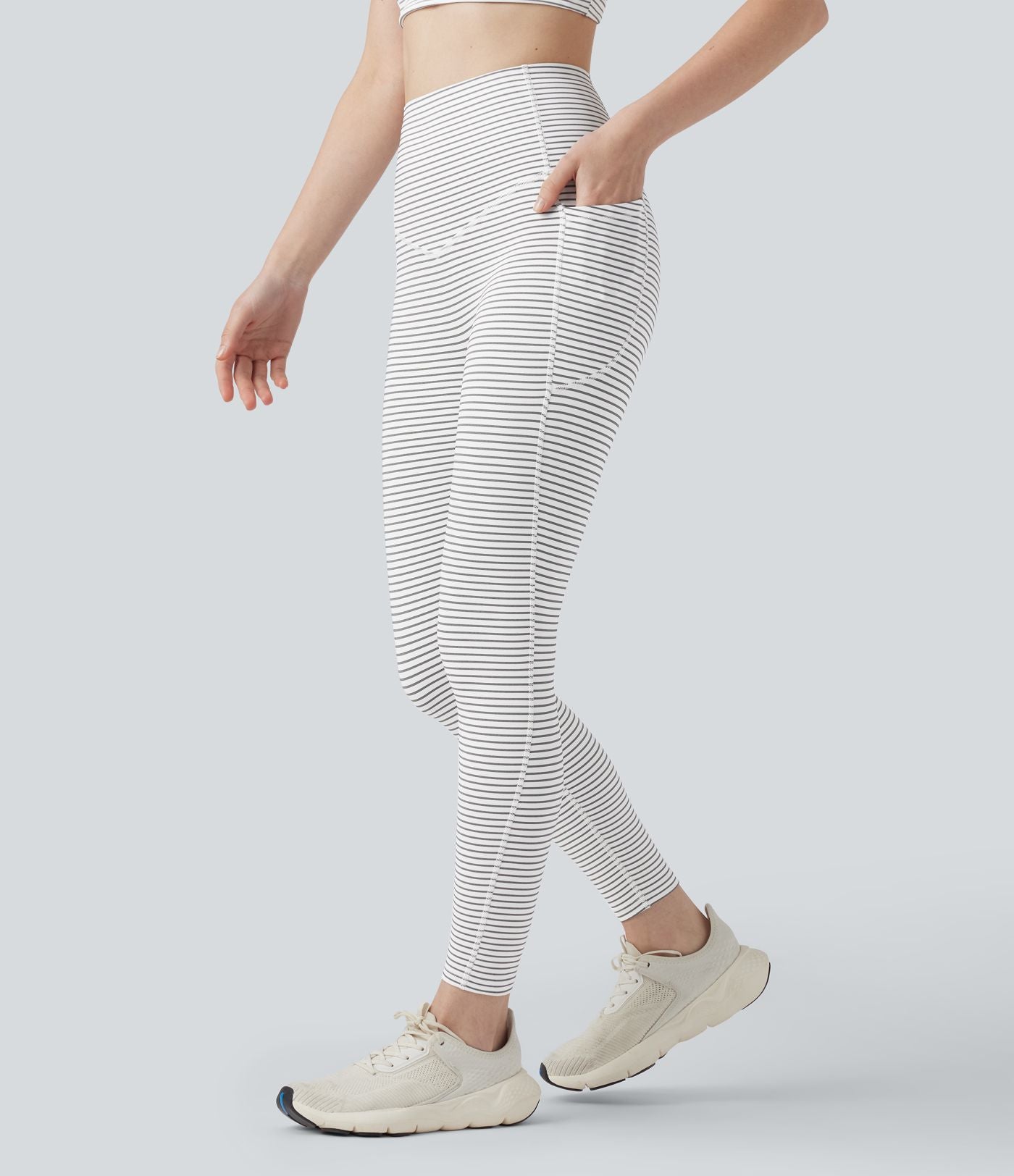 Legging de yoga taille haute gainant à rayures avec poches